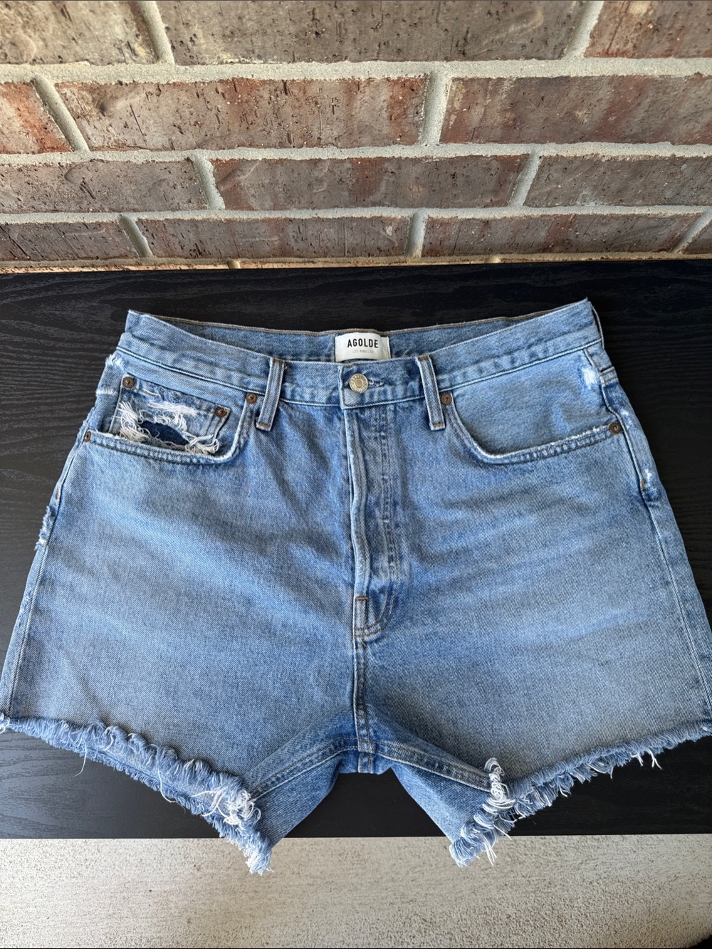 Agolde Light Wash Distressed Denim Shorts
